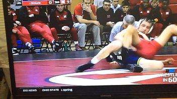 Blue wrestler shoves his cock on red wrestler's ass