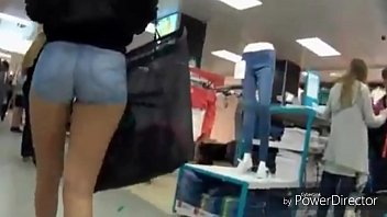 Candid voyeur spying with hidden cam in mall at tight teen in jean booty shorts DAMN!