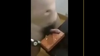 OMG guy beating own penis with hammer
