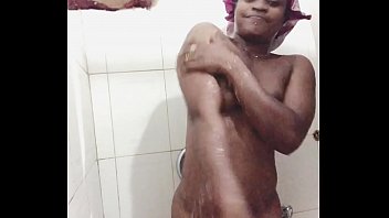 African girl with shower and finger herself, squirting and moaning