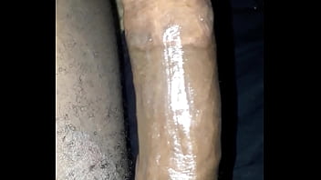 Extremely close up erect oily kenyan black dick