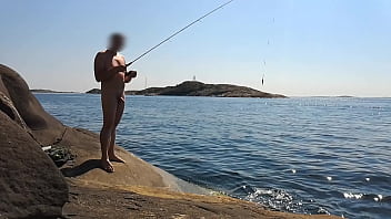 Naked public fishing on the nude beach